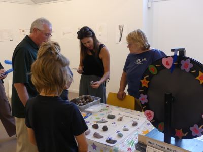 people looking at rocks